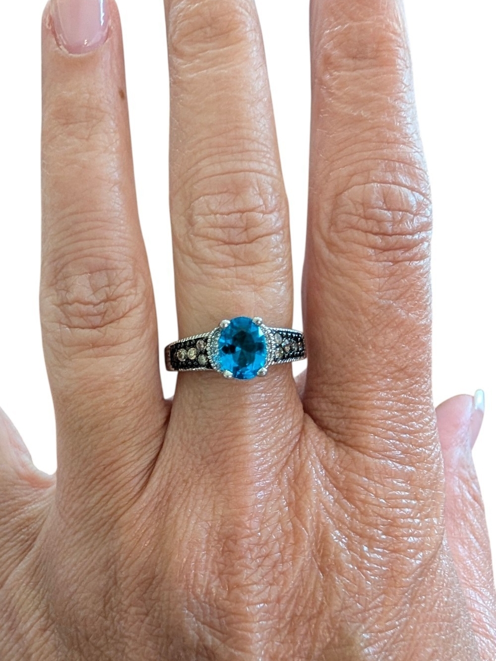 Silver Ring with Blue Gemstone and Accent Stones